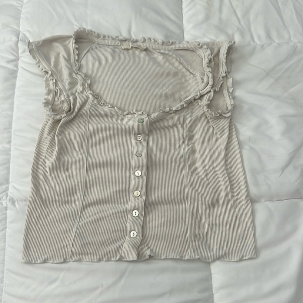Ruffled neckline and shoulder blouse, button up medium lightly worn